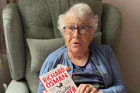 Resident at HC-One’s Hambleton Grange Care Home with The Thursday Murder Club novel