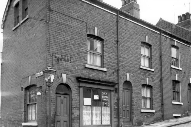 A fish and chip shop at the junction of Highfield Street and South Ridge Street. It is advertising that it will be open 'Friday Dinner' at 11.30. In the side window is a notice proclaiming that it is under new management.