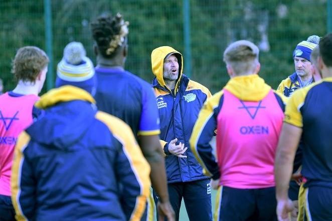 Rhinos' coach talks to his players during their return to training after the Christmas/new year break.
