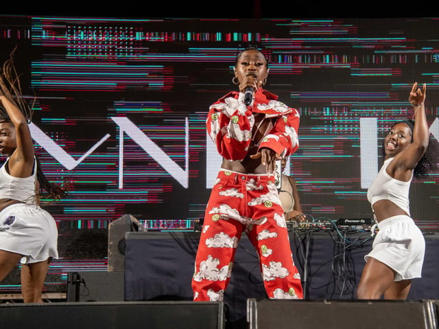 R&B singer-songwriter Mnelia performs
