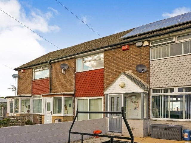 This two bedroom townhouse is located in Manor Farm Drive, Middleton. Downstairs, there is an entrance porch, entrance hall, a spacious through-lounge and a modern open-plan fitted kitchen. Upstairs, there are two good-sized bedrooms and a house bathroom. It also has front and rear gardens. It's on the market for £120,000.
