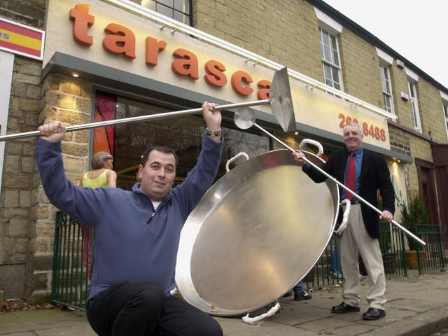 A new giant paella pan arrives from Spain to Spanish restaurant, Tarasca, in Chapel Allerton, Leeds. Pictured in November, 2002, is manager Vincent Bremaud, left, and owner Nigel Crinson.
