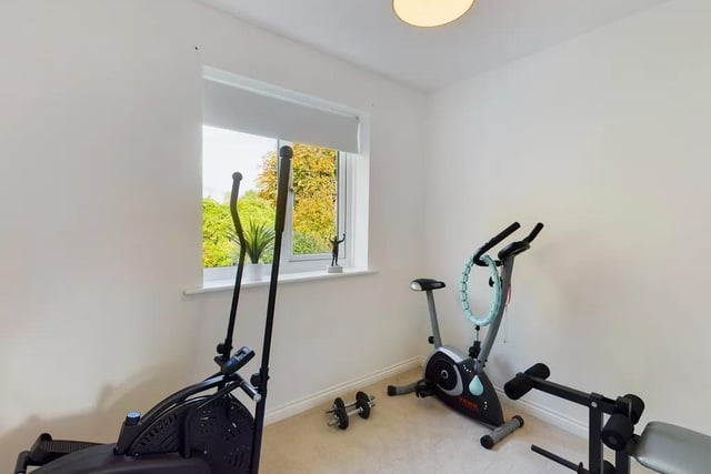 The fourth bedroom, a single, is currently used as a gym space