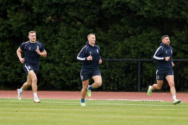 Rhinos' Mikolaj Oledzki, centre, in England training alongside Grand Final rivals Matty Lees and Tommy Makinson, of St Helens. Picture by Paul Currie/SWpix.com.