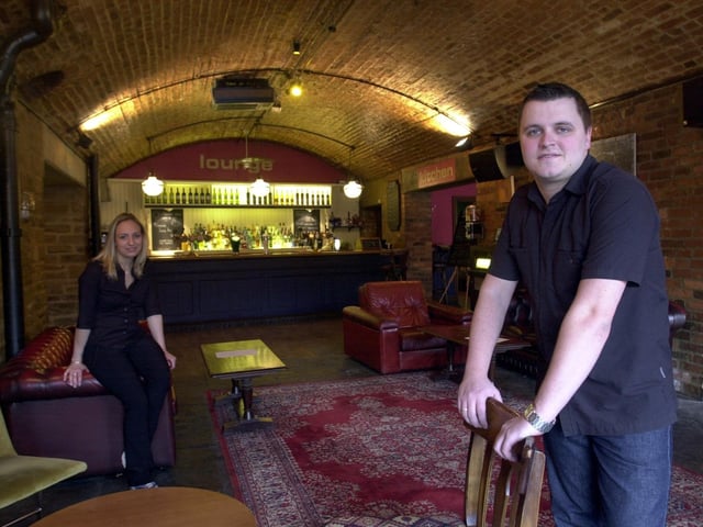 Inside the Aire Bar on The Calls in April 2002. Pictured left is bar staff Hayley Gallacher with manager Dan Burkitt.