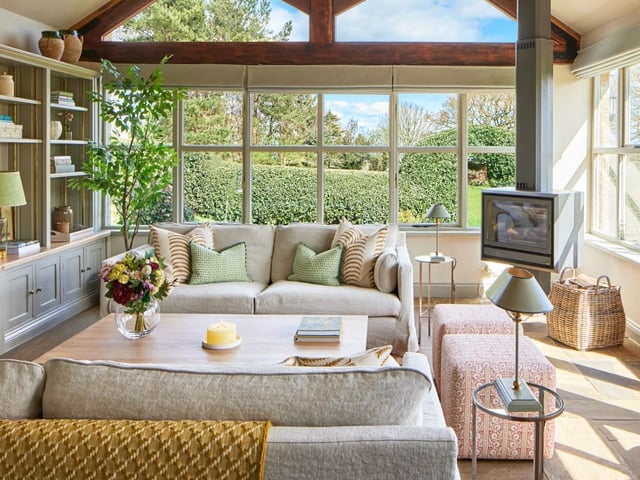 The ground floor also has a cosy sitting room with a traditional fireplace that provides another perfect place for a family to relax and unwind in.