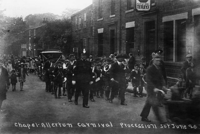 The Chapel Allerton Carnival procession passes The Regent Inn on Regent Street in June 1930.