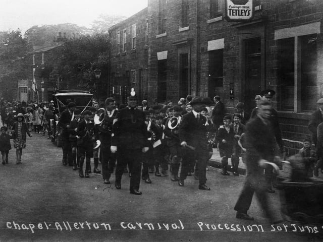 The Chapel Allerton Carnival procession passes The Regent Inn on Regent Street in June 1930.
