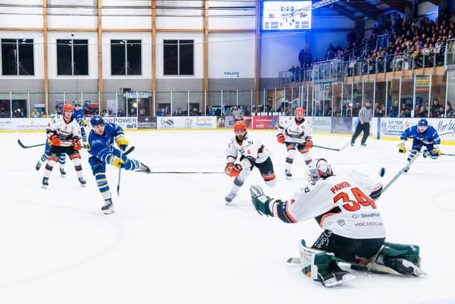 DON'T STOP ME NOW: Finley Bradon fires home past Sheffield Steeldogs' goalie Brady Parker, for his second goal of the night in a 5-4 win for Leeds Knights on Friday. Picture: Kev Bland/Knights Media.