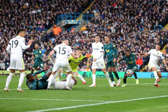 LEEDS, ENGLAND - OCTOBER 02: Christian Kabasele of Watford FC scores a goal past Illan Meslier of Leeds United that was later disallowed during the Premier League match between Leeds United and Watford at Elland Road on October 02, 2021 in Leeds, England. (Photo by Alex Pantling/Getty Images)