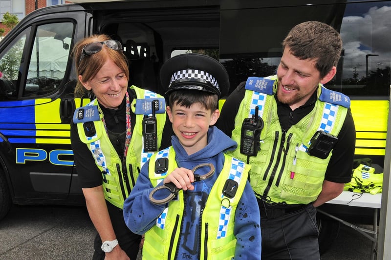 Eight-year-old Max Daly, of Moortown, with PCSO Sian Riley and PCSO Allan Holmes of Stainbeck Police Station