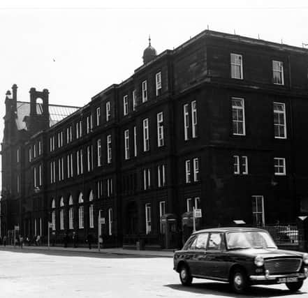 The General Post Office in City Square pictured in June 1967. Also visible are four 'fare stage' bus stops. An Austin 1100 is in the forefront of the image.