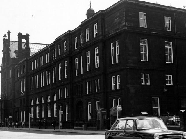 The General Post Office in City Square pictured in June 1967. Also visible are four 'fare stage' bus stops. An Austin 1100 is in the forefront of the image.