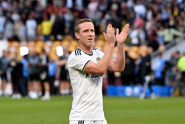 Adam Forshaw of Leeds United thanks the Leeds fans after the 2022 Queensland Champions Cup match between Aston Villa and Leeds United at Suncorp Stadium (Photo by Bradley Kanaris/Getty Images)