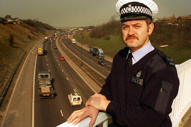 Sgt Stephen Chappell pictured in April 1996 at the spot on the bridge over the M62 at Gildersome where he saved a man from jumping off. He was to receive a Humane Society Award.