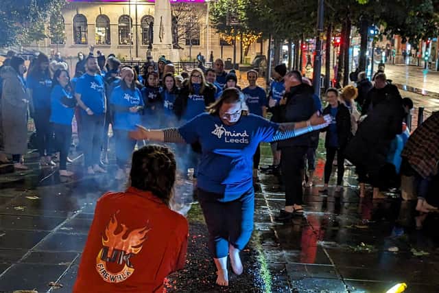 Participants at last year's Firewalk