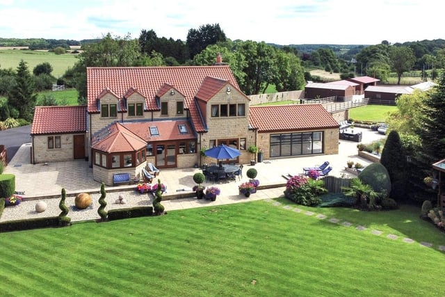 This fantastic equestrian property boasts around 12 acres of land with exceptional state of the art facilities and stabling, including a floodlit ménage