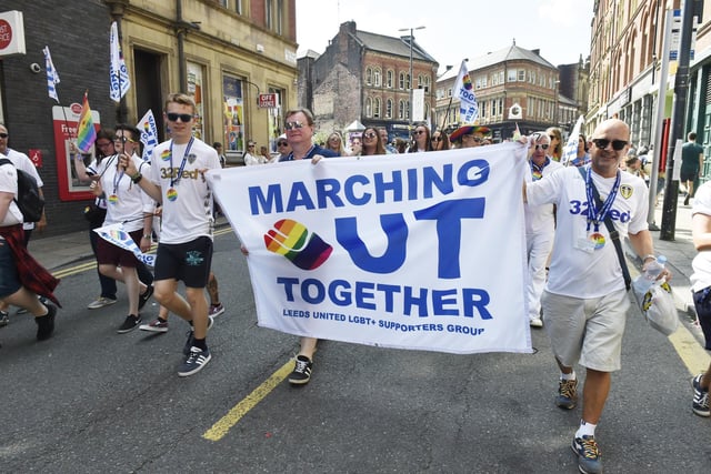 Marching Out Together, the Leeds United LGBT Supporters Group, setting off from Millennium Square.