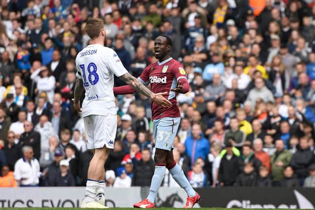 PREVIOUS CONTROVERSY - Albert Adomah of Aston Villa and Pontus Jansson of Leeds United square up during the 2019 Championship match, refereed by Stuart Attwell who takes charge of Sunday's re-run. Pic: Getty