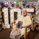 Lillian Todd celebrates her 105th birthday holding a card from the KIng, and 100's of birthday cards from complete strangers after Aire View Care Home in Kirkstall put out an appeal. Photo: Bruce Rollinson