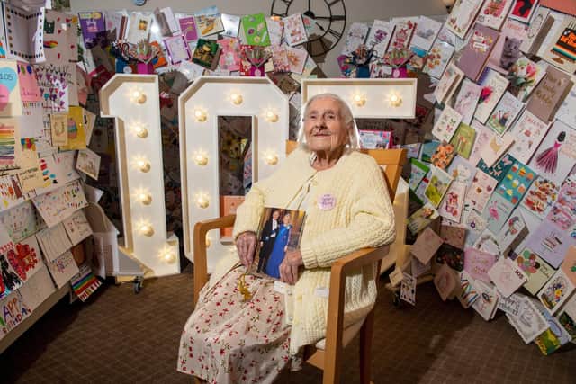 Lillian Todd celebrates her 105th birthday holding a card from the KIng, and 100's of birthday cards from complete strangers after Aire View Care Home in Kirkstall put out an appeal. Photo: Bruce Rollinson