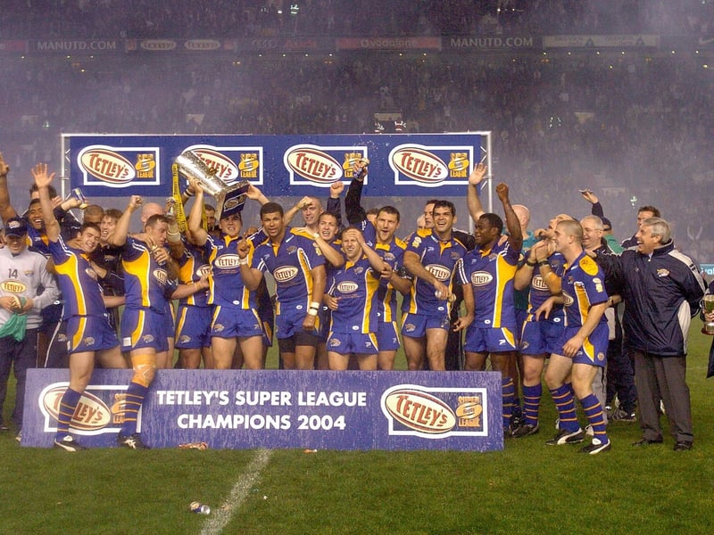 Leeds Rhinos celebrate with the Super League trophy after beating Bradford Bulls in the Grand Final at Old Trafford on October 16, 2004.