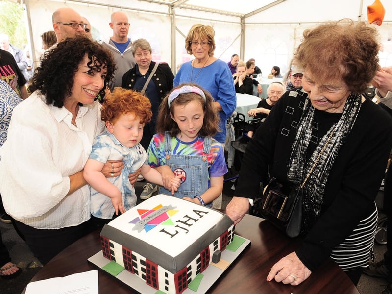 Jayne with LJHA's youngest residents, Remi Miller-Howard, two, and Jemima Howard, 10, and the oldest resident, 100-year-old Katie Grant
