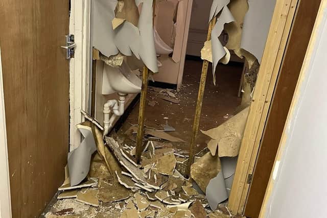 The wall separating the male and female toilets has been smashed through. Image: Farsley Celtic