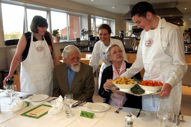 The Earl and Countess of Harewood are served a Victorian Feast at Betty's Cookery School, Harrogate, yesterday (wednesday) by pupils from Elmete Wood School, Leeds.
Pictured serving are pupils Donna Seabine and William Waller watched by Victoria Crebbin, Cookery School Course Manager, centre, on November 19, 2003.