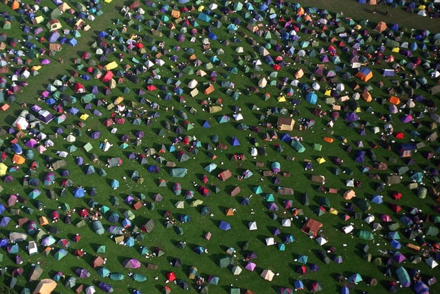 An aerial view of a tent city at Temple Newsam. Pictured are some of the 20,000 tents are pitched in fields surrounding the event.