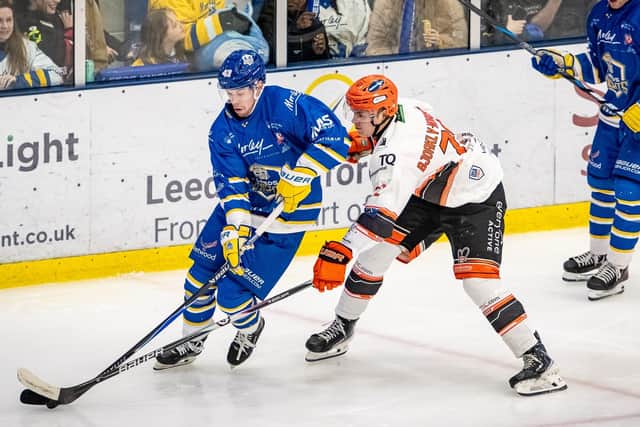 SEE YOU SOON: Leeds Knights' Sam Cooper (left) and Sheffield Steeldogs' Ivan Björkly-Nordström battle for puck possession in Thursday's first leg of the NIHL National Cup final - the tie concludes in Sheffield on March 11. Picture: Ben Gordon/Knights Media.