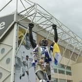 LEEDS, ENGLAND - AUGUST 06: A general view of the statue of Billy Bremner, covered with scarfs and flags, on the outside of the stadium prior to kick off of the Premier League match between Leeds United and Wolverhampton Wanderers at Elland Road on August 06, 2022 in Leeds, England. (Photo by David Rogers/Getty Images)