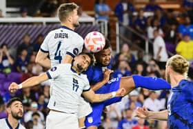 KEY ROLE: Played by Leeds United's Weston McKennie, centre, pictured winning a header as part of a 1-0 victory for the USA against El Salvador in which the Whites midfielder provided the match-winning assist. Photo by Julio Aguilar/Getty Images.