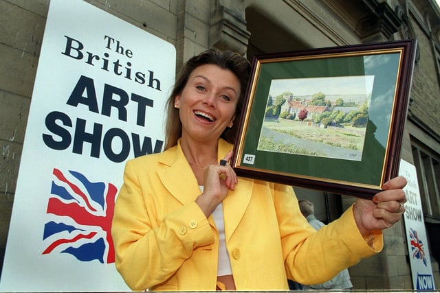 Heartbeat TV series actress Tricia Penrose who opened the British Art Show in Ilkley in September 1999. She is pictured with a painting with Leeds artist Deborah Dyer from Goatland where the series is filmed.