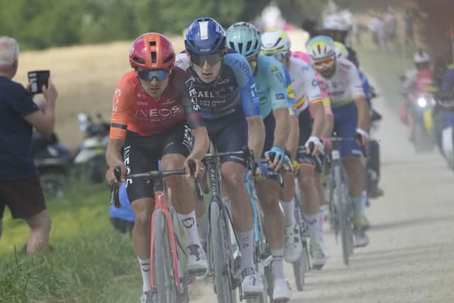 CATCH ME IF YOU CAN: Tom Pidcock, front, is followed by Canada's Derek Gee during the ninth stage of the Tour de France which finished in Troyes after 123.7 miles Picture: AP/Jerome Delay