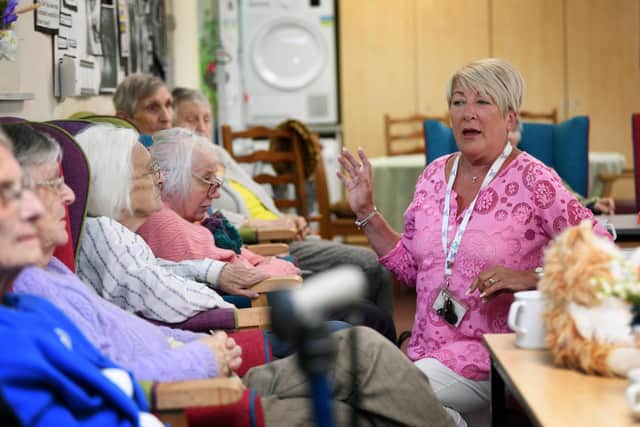 Amanda Botterill, right, is the owner of Memory Lane Day Care in Yeadon, a service providing respite care for people with dementia. Photo: Jonathan Gawthorpe