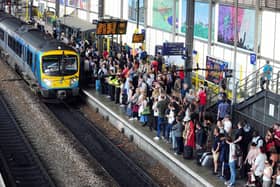 Rail passengers at Leeds Railway Station. PIC: Simon Hulme