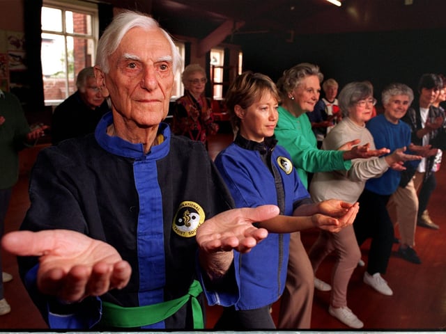 Douglas Henderson, 86, leads a Tai Chi session at Garforth Community Centre on Main Street in March 1997.