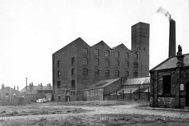 The south side of Cross Chancellor Street, showing Perserverence Mills and Ridge Way Mission Hall in August 1956. The Mills were owned by H.G.Graham & Sons Ltd.