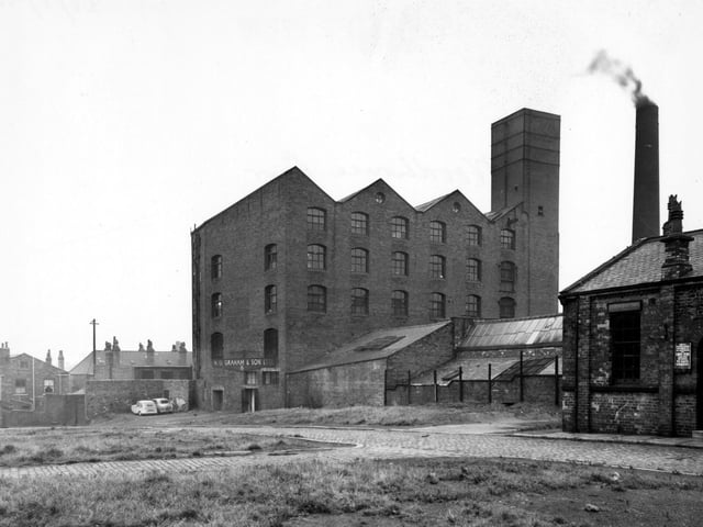 The south side of Cross Chancellor Street, showing Perserverence Mills and Ridge Way Mission Hall in August 1956. The Mills were owned by H.G.Graham & Sons Ltd.