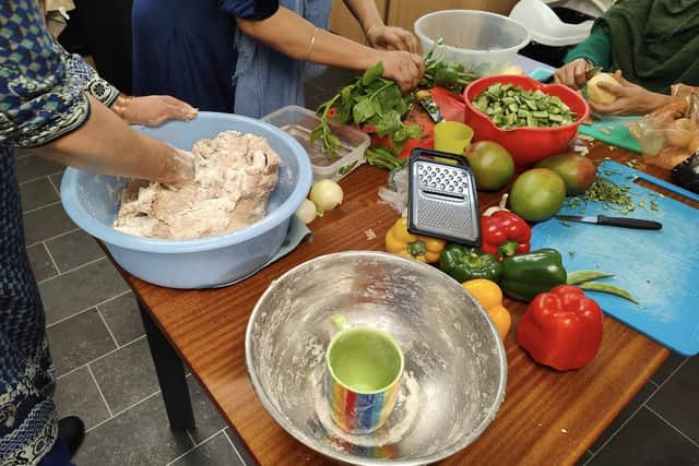 A workshop about healthy cooking, held at Asha, Leeds.