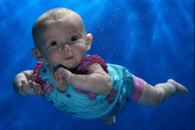 Alana pictured at just six weeks old during her very first Puddle Ducks lessons