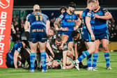 Wakefield players appear despondent after Scott Taylor's late try. (Photo: Alex Whitehead/SWpix.com)