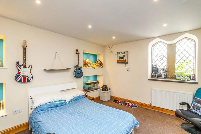 Another double bedroom, with lots of space and a lovely character window.