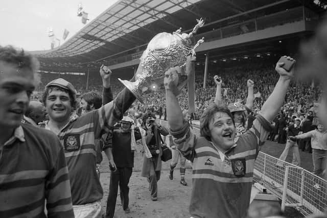 Kevin Dick, right, leads Leeds' celebrations at Wembley in 1978. Picture by Steve Riding.