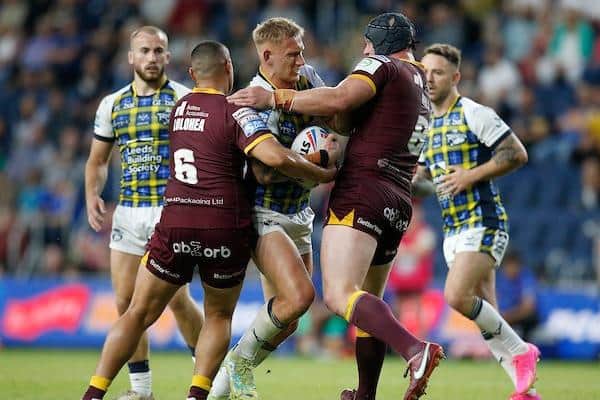 Mikolaj Oledzki in action for Rhinos against this Sunday's opponents Huddersfield in April. Picture by Ed Sykes/SWpix.com.