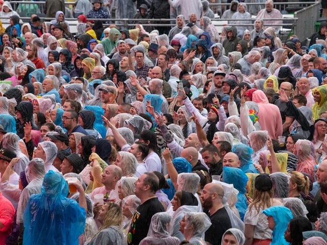 Not even rain could dampen the crowd's spirits. Photos by Cuffe and Taylor and The Piece Hall