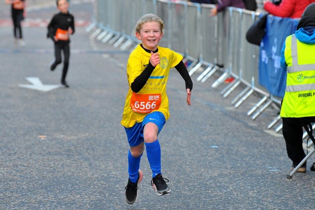 The joy of running in the face of Elsie Smith of Horsforth St Margaret's FC junior race. (pic by Steve Riding)