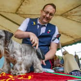 Pictured is Darren Pearson with his cesky terrier on the first day at Leeds Championship Dog Show at Harewood House.