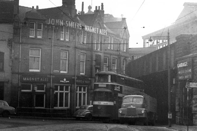 Tram no. 566, on what may have been its last journey on this particular route. Car 566 was last in service on October 10, 1957, was scrapped on March 26, 1959 and was burnt at Churwell on April 4, 1959. It is pictured travelling underneath railway bridge on Bishopgate Street.